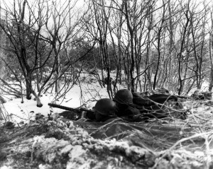 An American road-block with .30 caliber machine gun in the Ardennes, December 1944